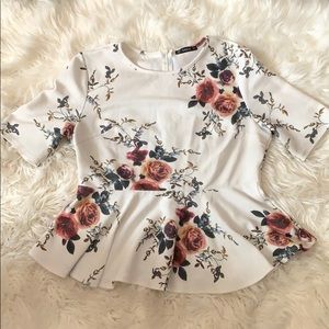 Zip back ruffle hem peplum top